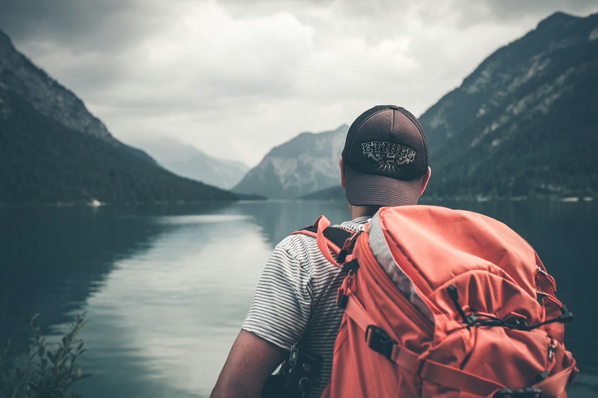 Traveler overlooking mountains